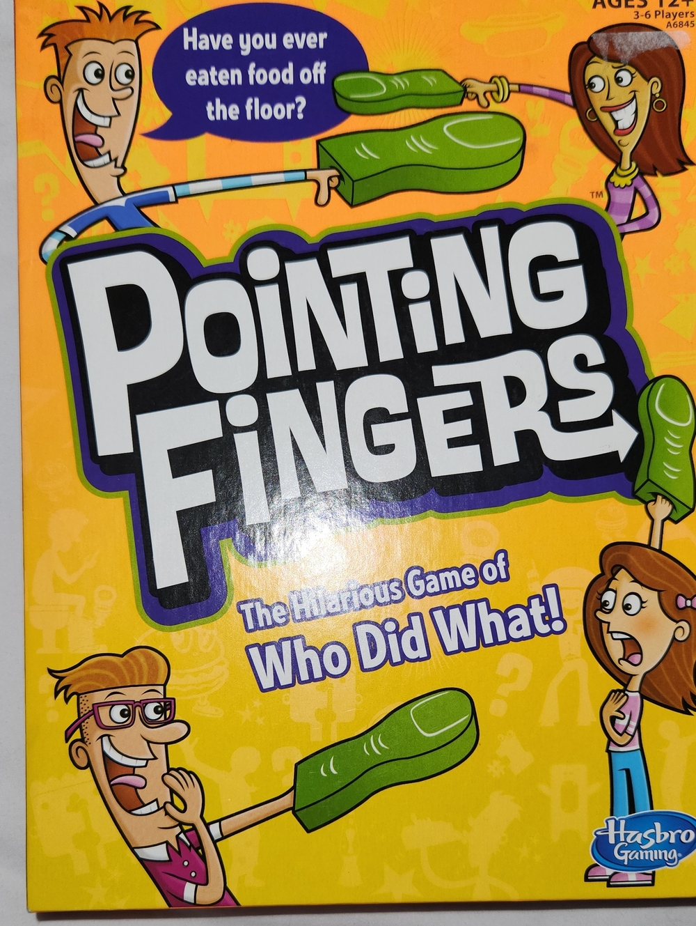 Hasbro Pointing Fingers Party Game - Yellow and Green Artwork